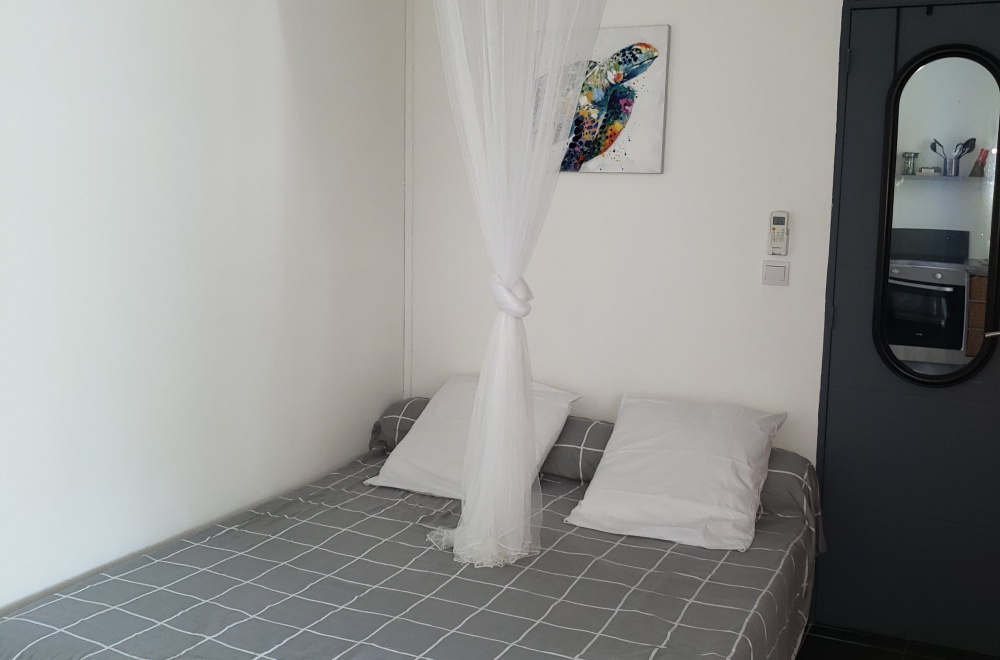 Tropiques lit dans pi&egrave;ce de vie